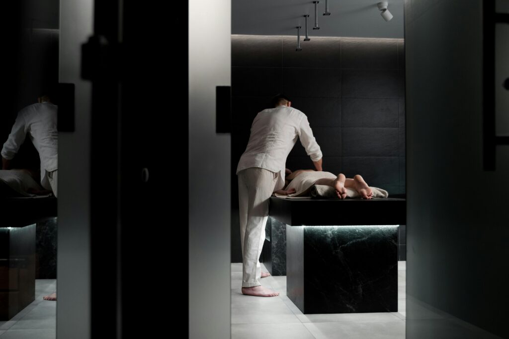 A relaxing massage in a modern spa room promoting wellness and self-care.